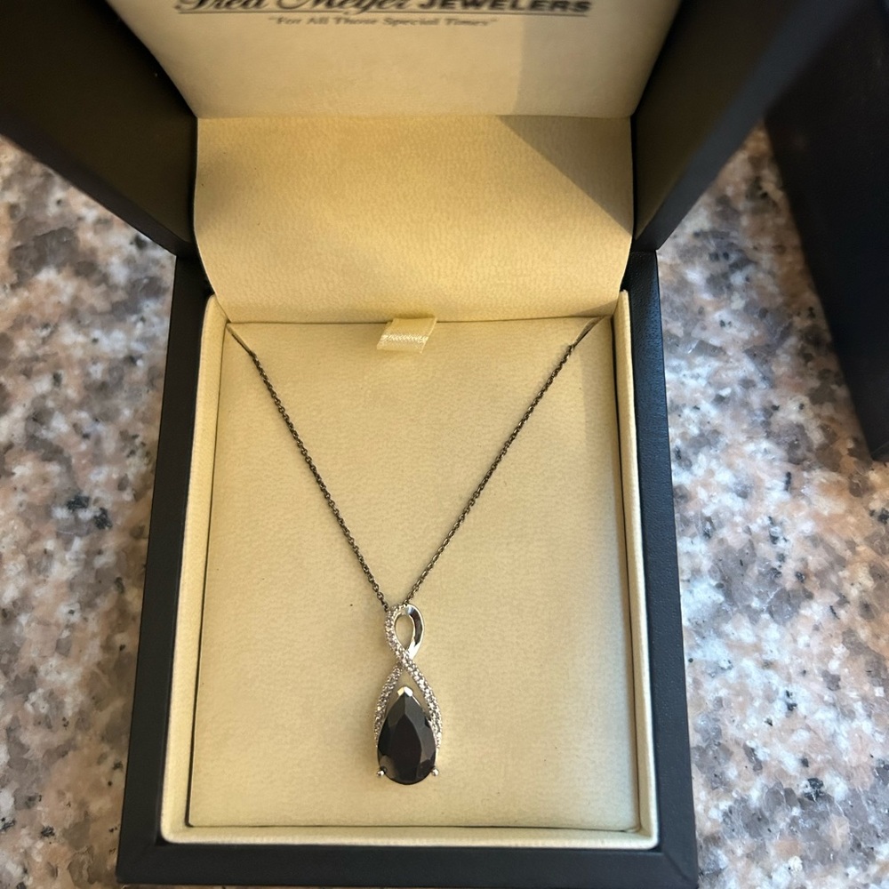 Garnet and Diamond Pendant in Sterling Silver - never worn